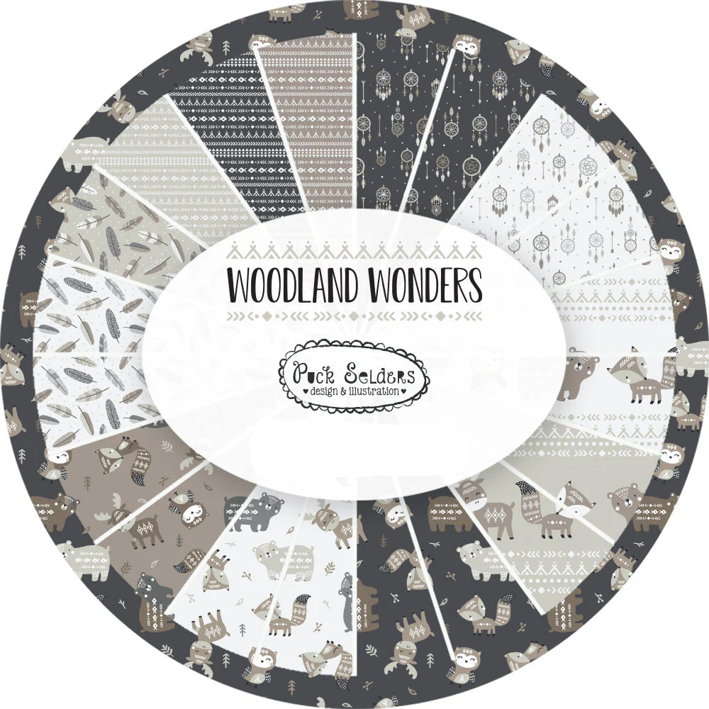 Round wheel of fabric swatches with 'Woodland Wonders' design and 'Puck Seedlings' branding.