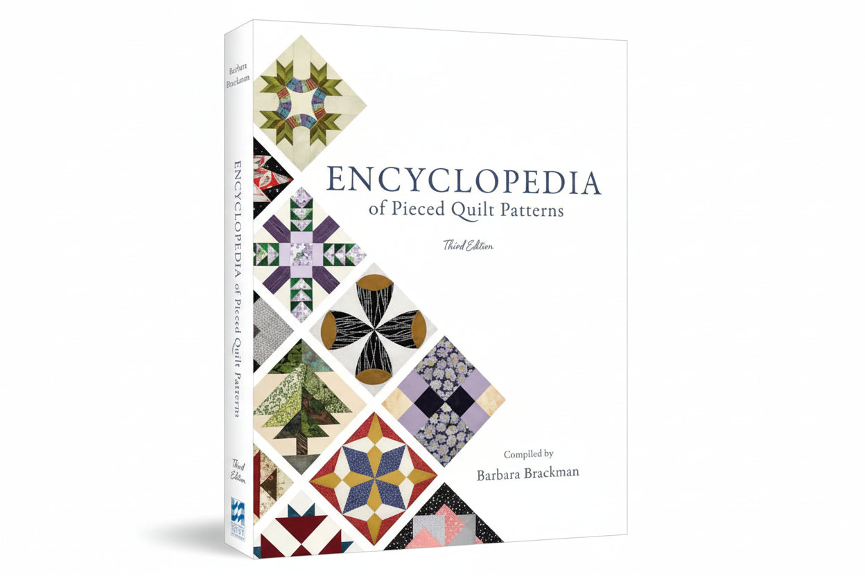 Book titled 'Encyclopedia of Pieced Quilt Patterns' with quilt pattern images on a white background